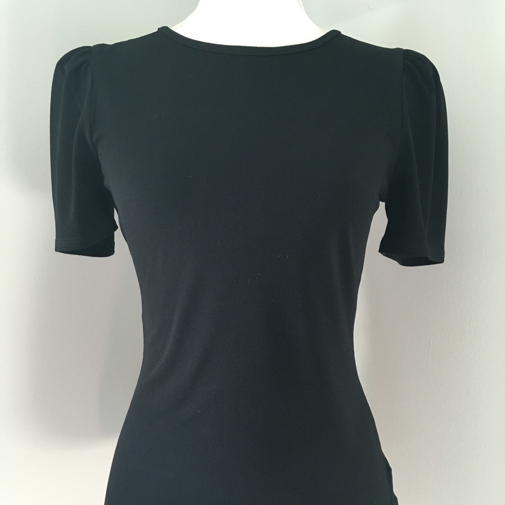 Black feminine, body conscious top